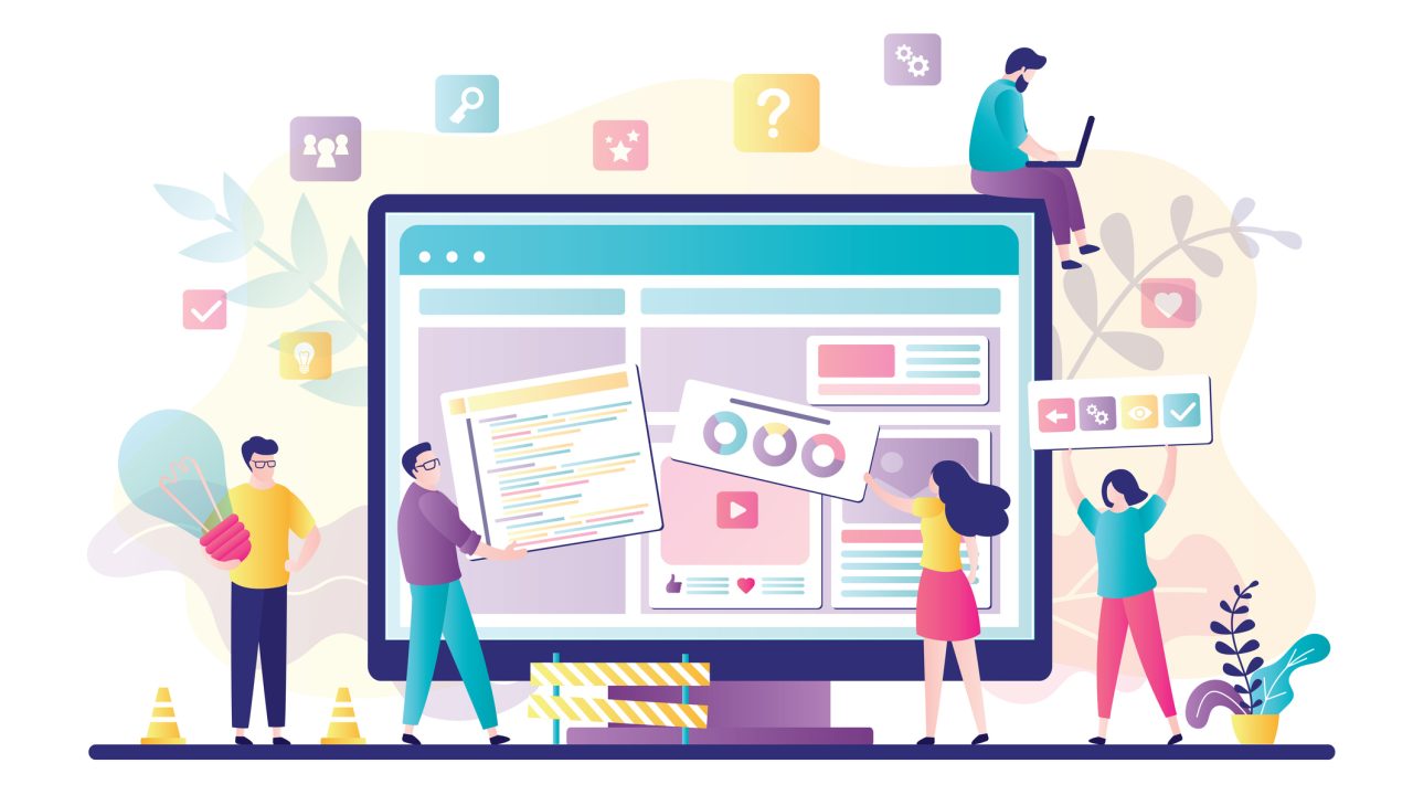 Business team working together on web page design. People building website interface on computer. Web development, teamwork,